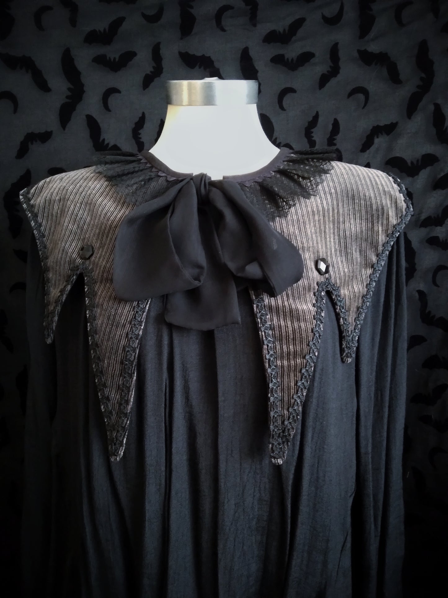 Oddette Pointed Bat Capelet